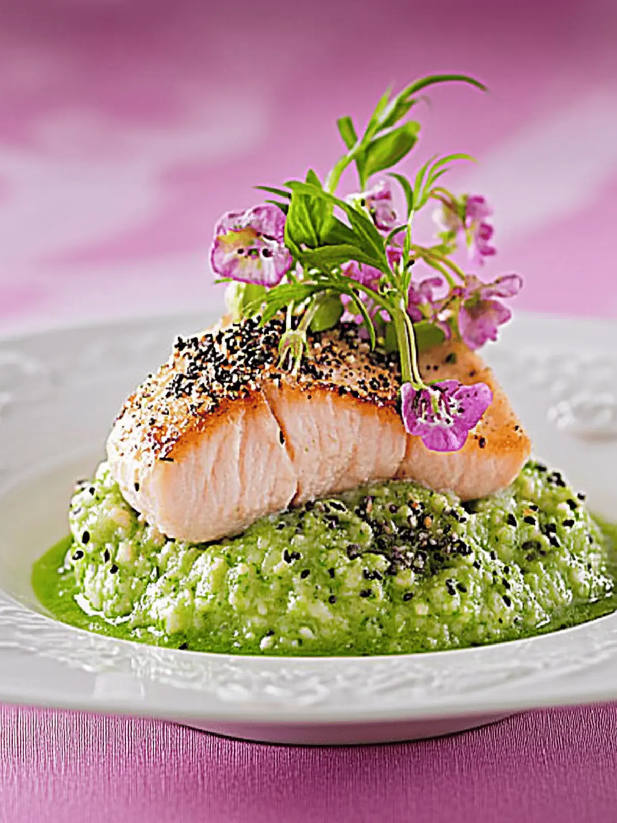 Salmon in sesame crust on pea puree and sugar snap pea straw